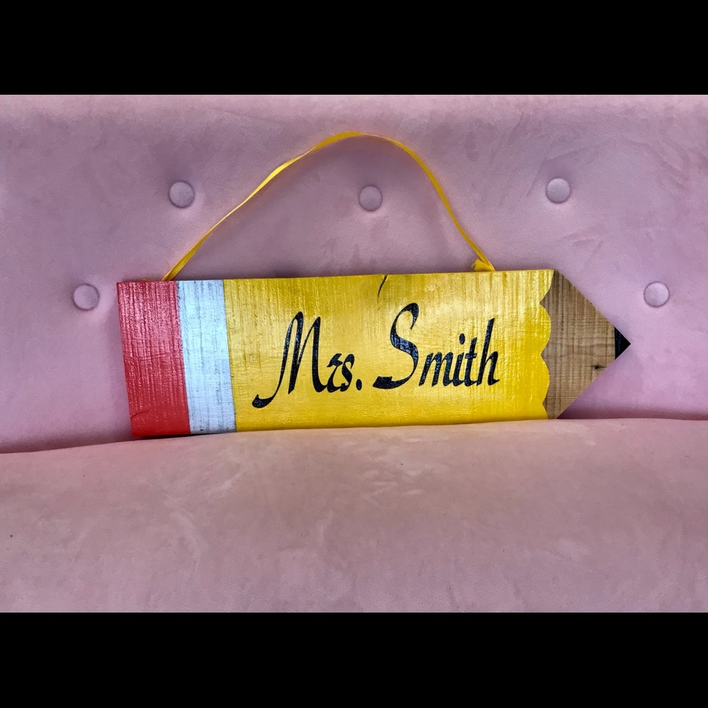 Teacher pencil sign